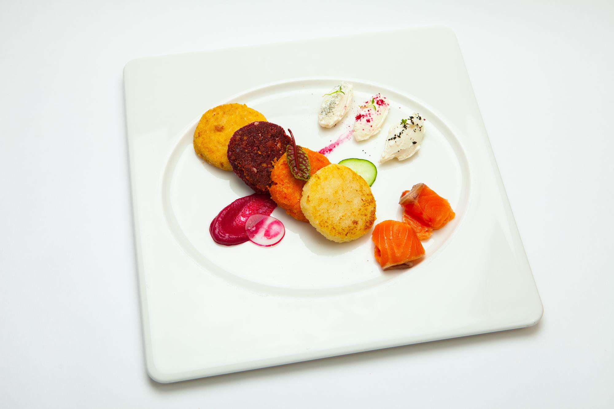 arrangement of plated small bites